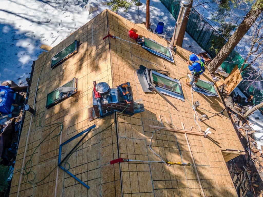 Local Victorville roofer using industrial nail gun for residential roof installation project